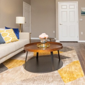 Beautiful living areas to match your lifestyle a living room with a couch and a coffee table