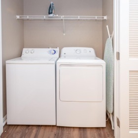We've got your laundry sorted a white laundry machine in a room