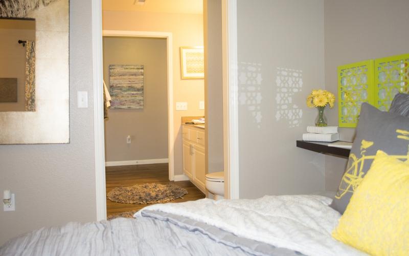 Beautiful bedrooms to fit every need a bedroom with a bed and a side table